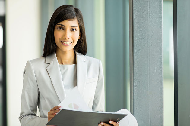 Businesswoman holding a financial report