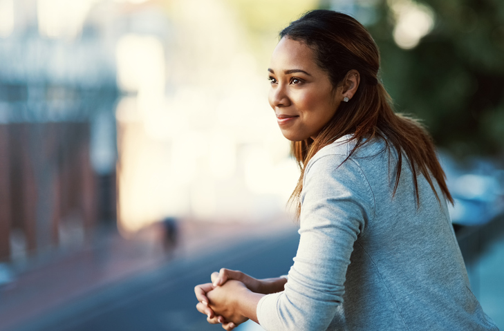 a businesswoman thinking about franchising her business