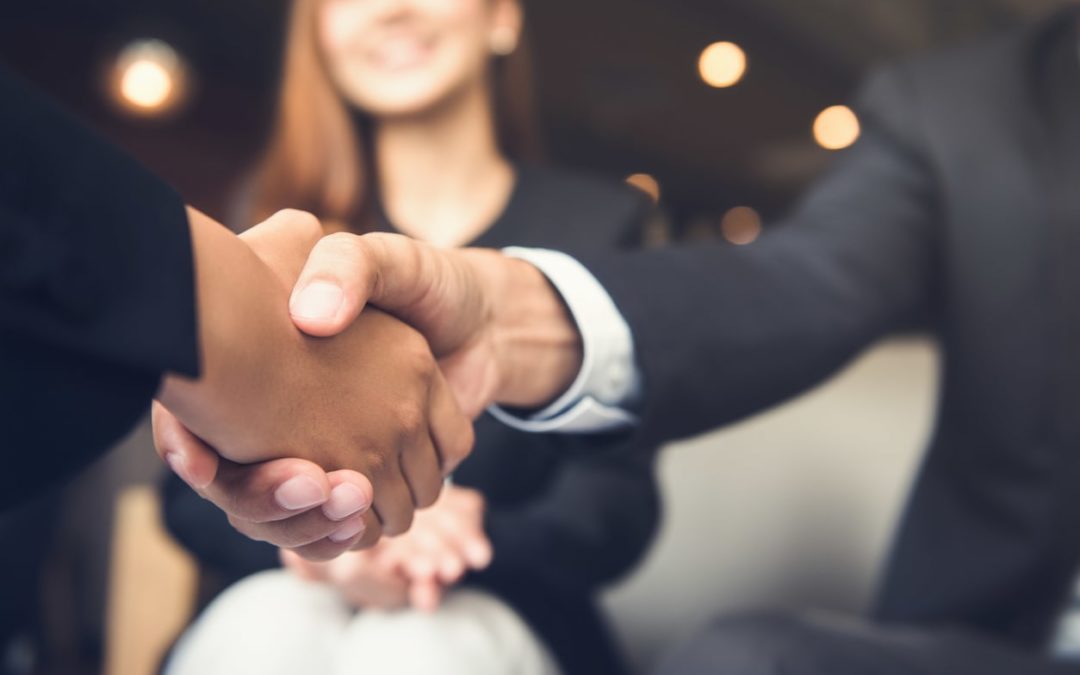 shaking hands to seal a business deal