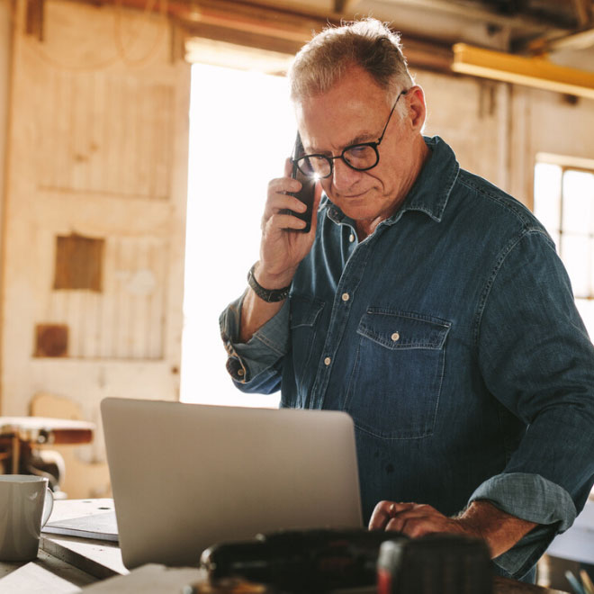 an experienced entrepreneur on the phone