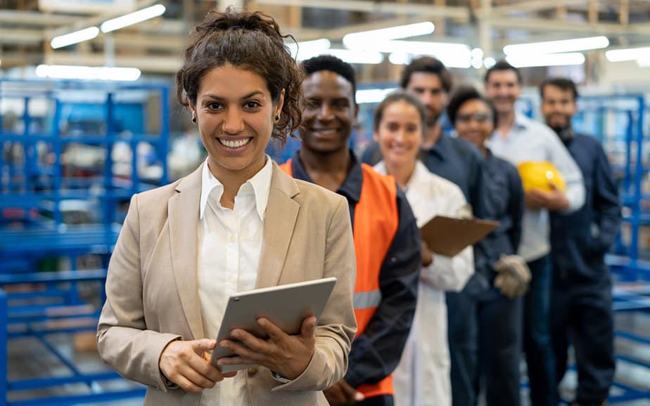 blue collar workers, engineers and inspectors standing