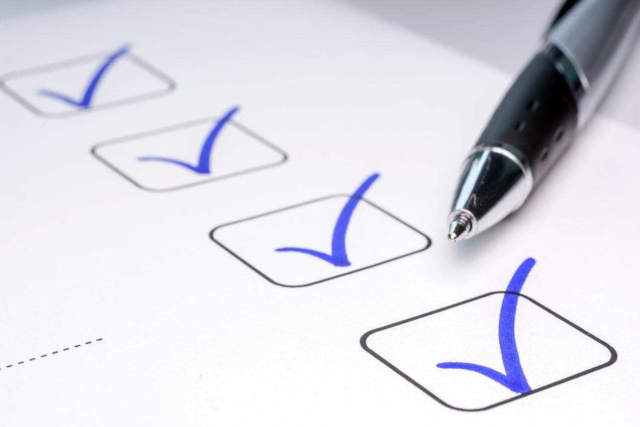 checklist marked with blue check marks