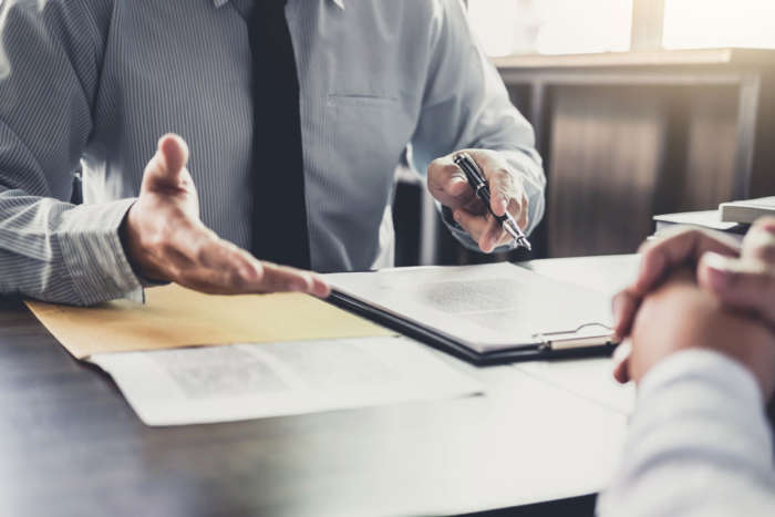 reviewing a franchise contact with a consultant